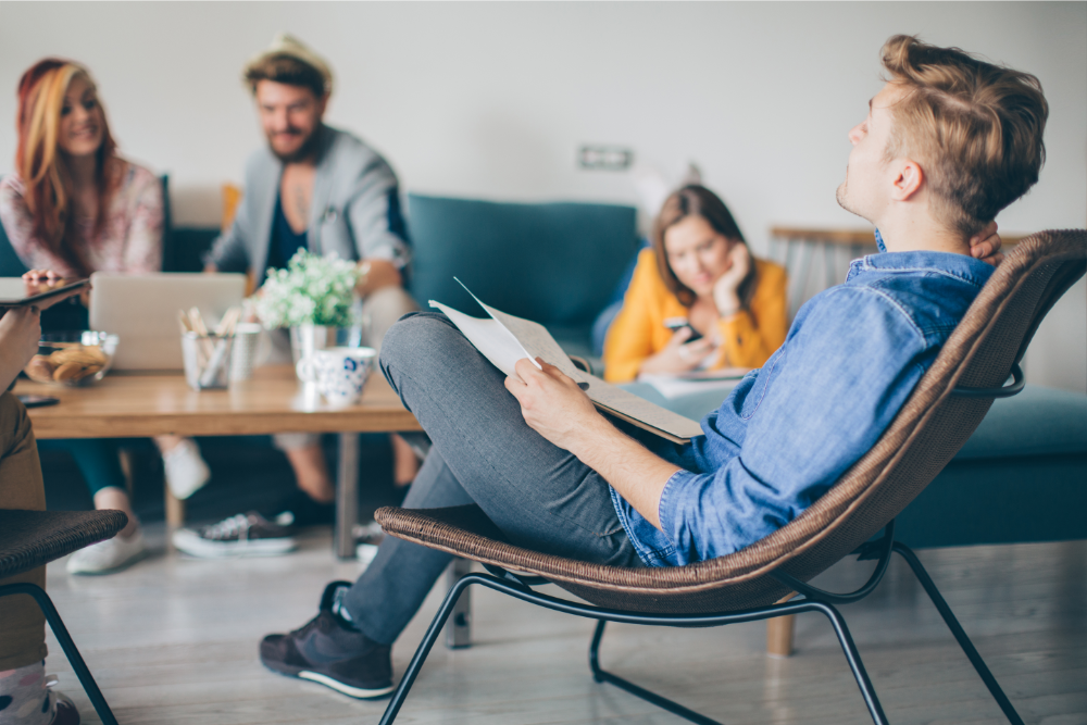 A group of people spending time in a coliving apartment