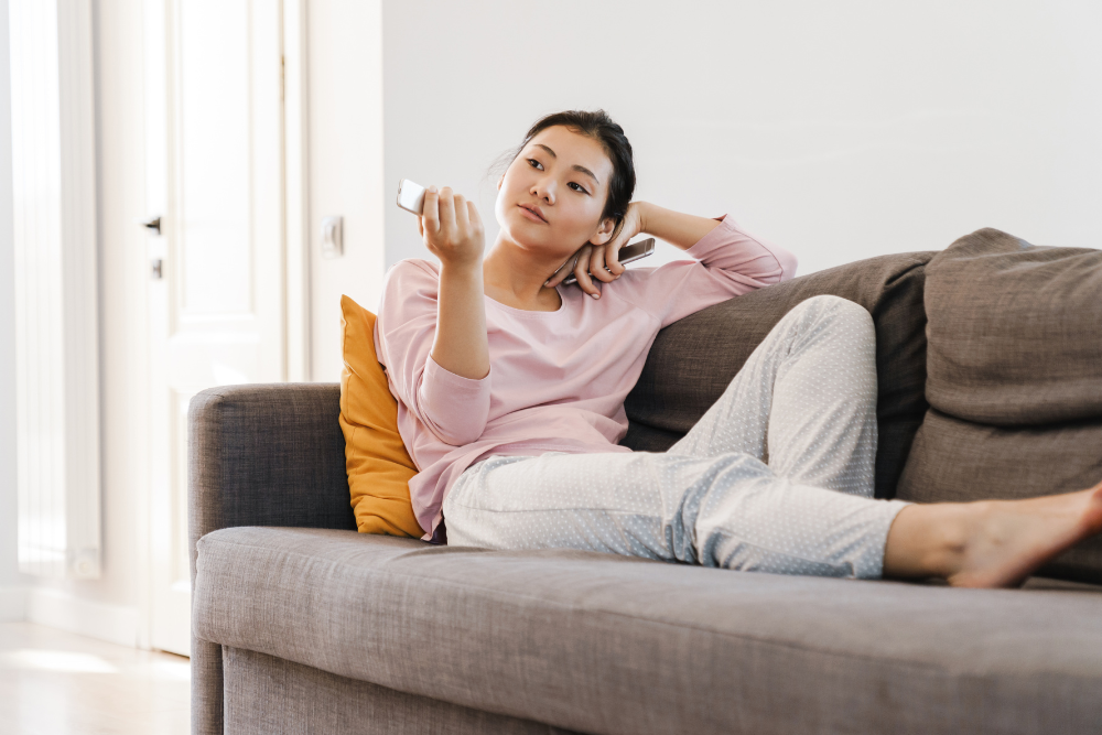 A woman in a studio apartment in coliving